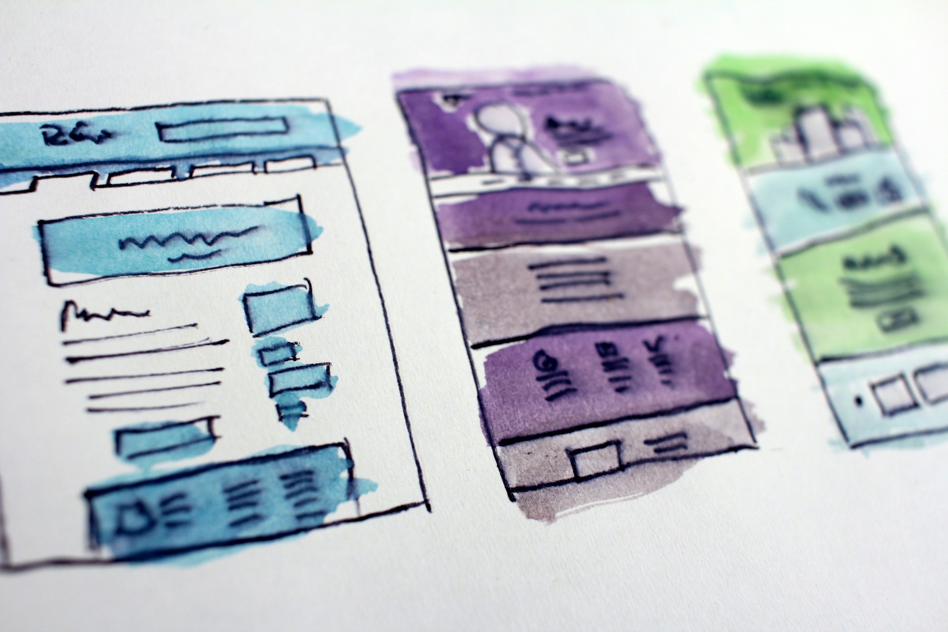UX wireframes drawn on paper